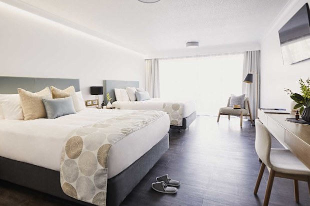 Daydream Island's pool-facing Superior Twin Room features a small balcony.