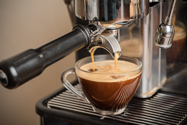 Espresso machine extracting coffee