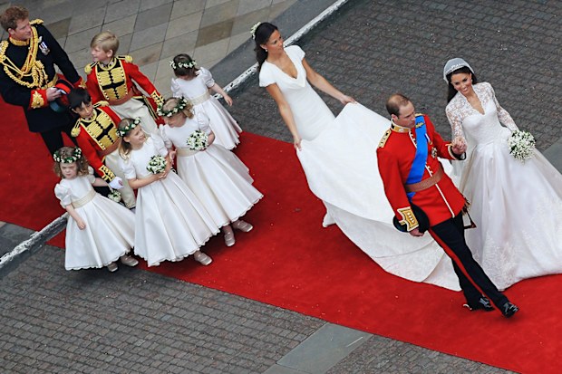 Their Royal Highnesses Prince William, Duke of Cambridge and Catherine, Duchess of Cambridge are followed by Maid of Honour Pippa Middleton, their page boys and bridesmaids and their best man Prince Harry as they prepare to begin their journey by carriage procession to Buckingham Palace following their marriage at Westminster Abbey on April 29, 2011 in London, England. The marriage of the second in line to the British throne was led by the Archbishop of Canterbury an