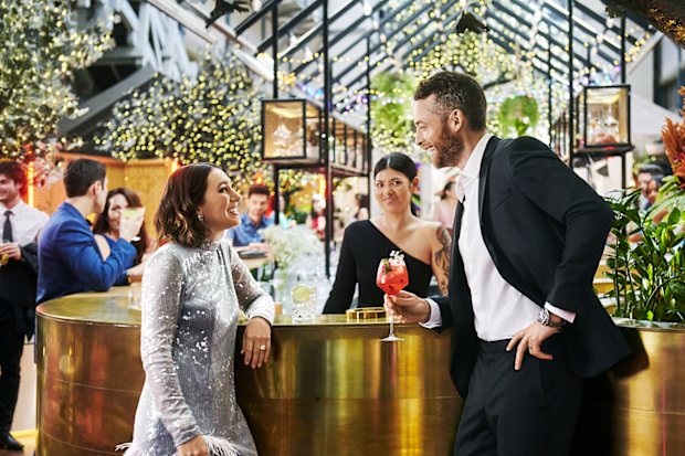Hamish and Zoe Foster Blake enjoy cocktails at Ovolo Wooloomooloo in Sydney
