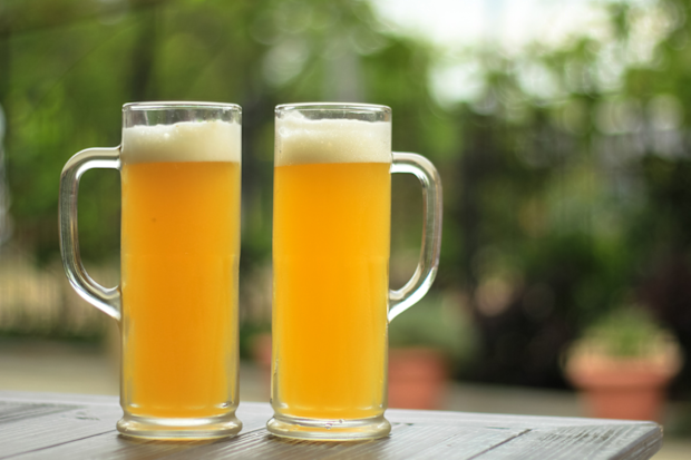 Two beers on outdoor table