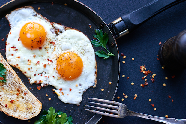 Breakfast of fried eggs in a flying pan