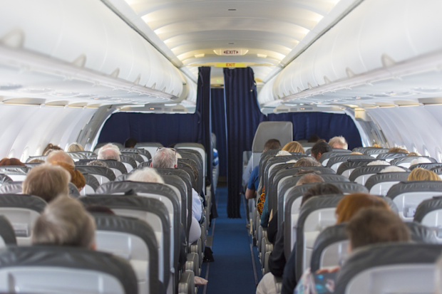 Packed plane / flight cabin