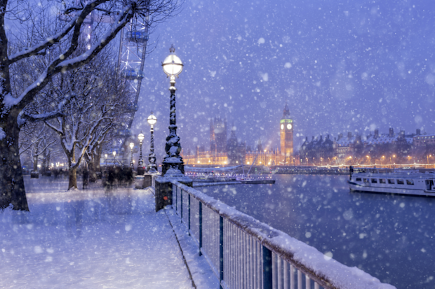 Snowing on Jubilee Gardens in London | UK white Christmas