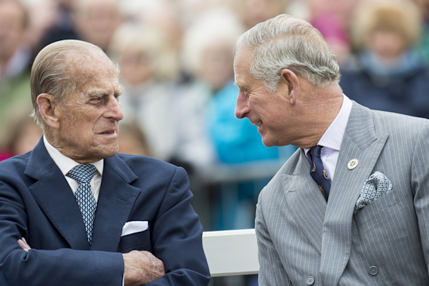 Prince Philip, Duke of Edinburgh and Prince Charles, Prince of Wales attend the unveiling of a statue of Queen Elizabeth The Queen Mother