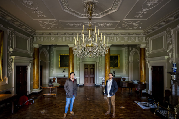 The chandelier in Castle Ward's reception hall was painstakingly cleaned piece by piece during the pandemic. 