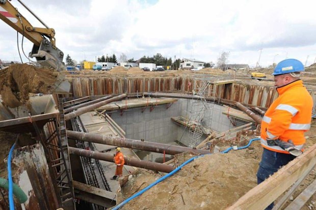 Construction workers build world's deepest pool at Deepspot in Poland