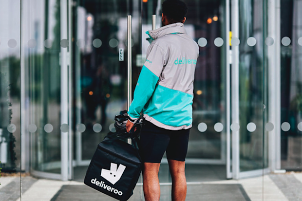 Deliveroo driver dropping off order