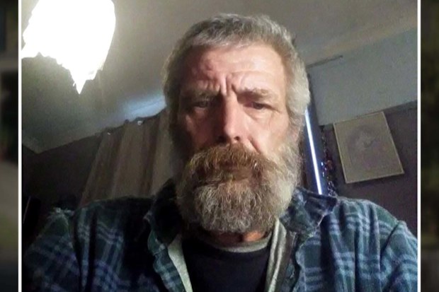 A man is behind bars accused of murdering his neighbour in a deadly end to what neighbours claim has been a long-running and bitter conflict.The pair allegedly squared off over a large gum tree that towers over their homes in Sydney.
CCTV appears to show Michael Wickham, 60, heading in towards the Dargie Street house in Mount Pritchard after steering his Suzuki into his neighbour's driveway.