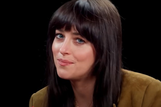 Dakota Johnson jokes about Madame Web backlash during an interview on Hot Ones