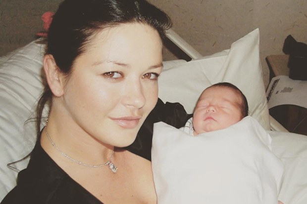 Catherine Zeta-Jones with son Dylan Douglas when he was a newborn.