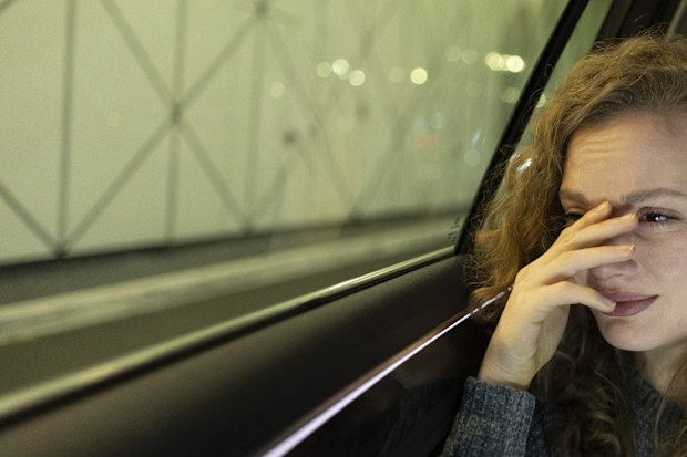 The girl relaxes on a late night drive, calls her loved ones on the phone, makes plans for the weekend and thinks about life.