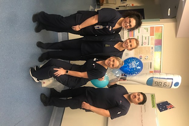 Nikki nurse who had cancer with her work colleagues