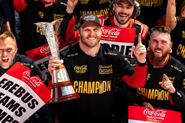 Brodie Kostecki celebrates winning the 2023 Supercars drivers' championship with his Erebus Motorsport team.