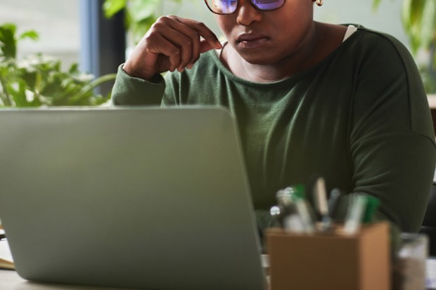 laptop woman working stock