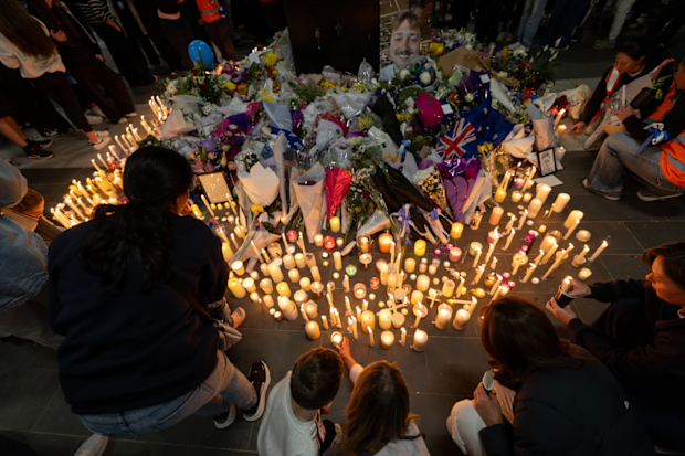 Thousands of people stood in silence at a vigil last night to honour 22-year-old Aidan Becker, who was allegedly murdered by four teenagers as he tried to help a younger boy who was allegedly being robbed at Mernda Station on Friday, March 6.