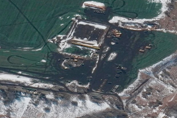 This Thursday, Feb. 24, 2022, satellite image provided by Maxar Technologies shows Russian forces remain deployed in and around the western outskirts of Belgorod, Russia, with artillery and multiple rocket launchers deployed in the area, approximately 10 miles north of the border with Ukraine. (Satellite image ©2022 Maxar Technologies via AP)