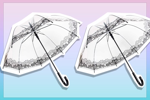 9PR: Large clear umbrella with black lace detailing.