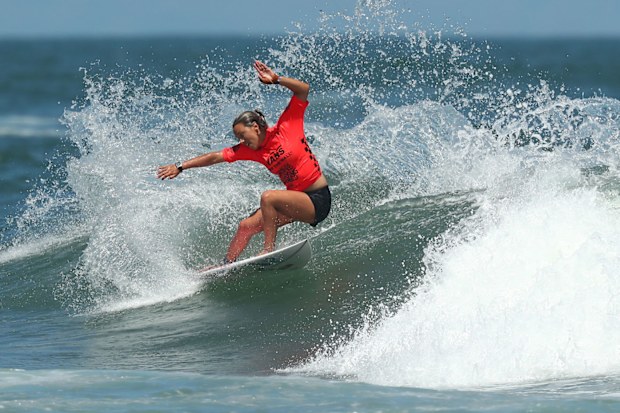 Sally Fitzgibbons surfing