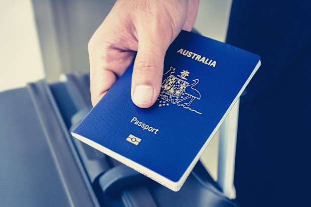 Man holding Australian passport