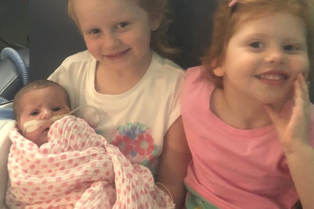 Molly finally went home to Kincumber last month to join sisters Ella, four and Sophie, two, after 55 days in hospital,