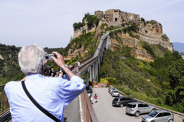 View of Civita di Bagnoregio village from the bridge, region Lazio, Italy.