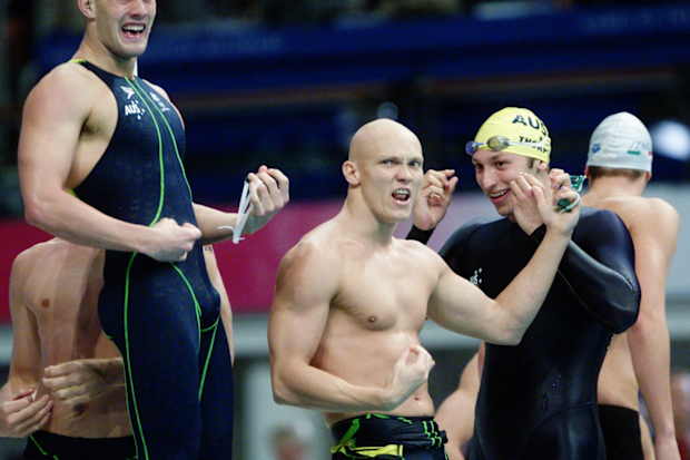 Michael Klim, Chris Fydler, Ashley Callus and Ian Thorpe celebrate 4x100m freestyle relay victory at the Sydney Olympics with guitar moves