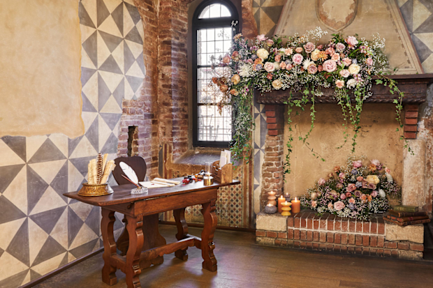 Casa di Giulietta in Verona. A historic writing desk with a feather quill