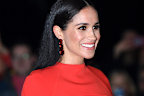 LONDON, ENGLAND - MARCH 07:  Meghan, Duchess of Sussex accompanied by Prince Harry, Duke of Sussex attends the Mountbatten Festival of Music at Royal Albert Hall on March 07, 2020 in London, England. (Photo by Karwai Tang/WireImage)