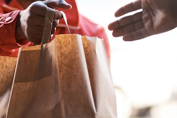 Man receiving food delivery