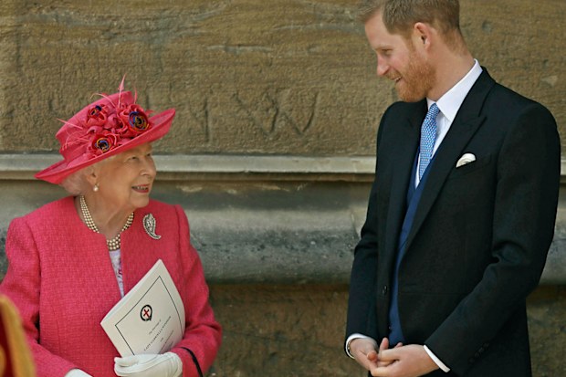Queen Elizabeth II talks to Prince Harry as they leave after the wedding of Lady Gabriella Windsor and Thomas Kingston at St George's Chapel, Windsor Castle, near London, England, Saturday, May 18, 2019