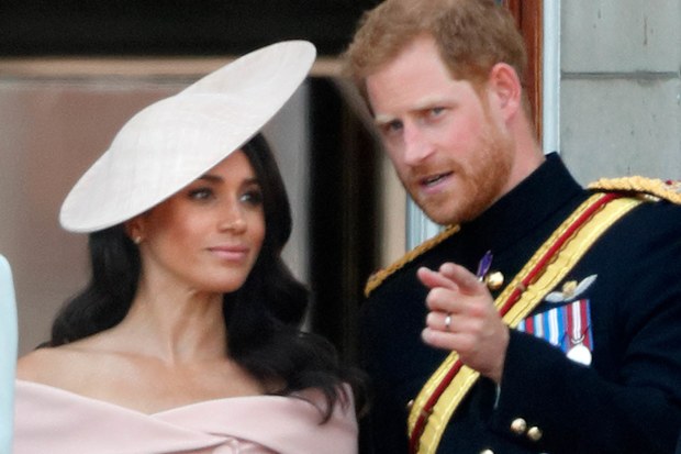Meghan, Duchess of Sussex, Prince Harry, Duke of Sussex and Isla Phillips stand on the balcony of Buckingham Palace during Trooping The Colour 2018 