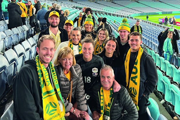 Mackenzie Arnold with her family at a Matildas game.