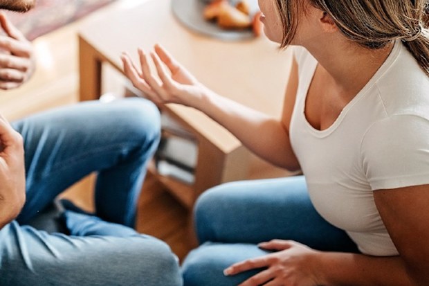 Couple fight living room at home