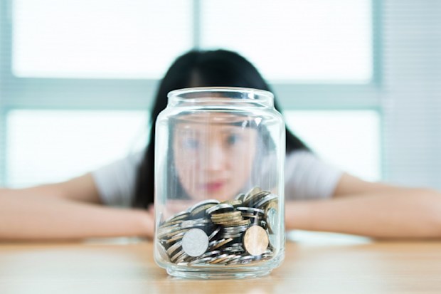 Woman with money jar