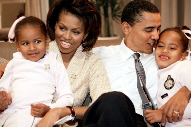 Michelle, Barack, Malia and Sasha Obama in 2004.