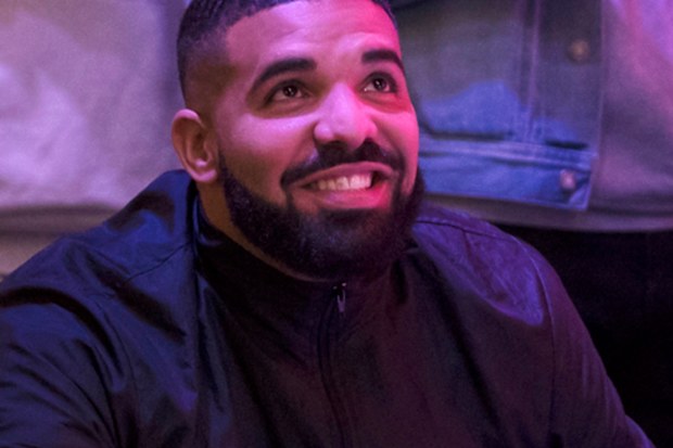Drake watches a screen alongside other Toronto Raptors fans as they gather to watch Game Six of the NBA Finals.