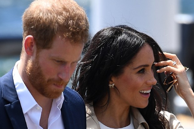 Harry and Meghan, the Duchess of Sussex arriving at the Sydney Opera House in Sydney.