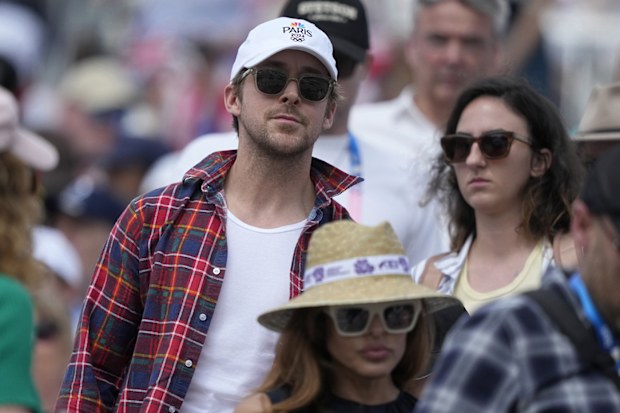 Eva Mendes and Ryan Gosling attend the dressage Individual Grand Prix Freestyle at the 2024 Summer Olympics, August 4, 2024, in Versailles, France. 