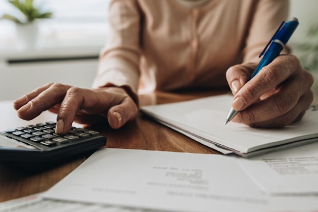 Woman paying bills.
