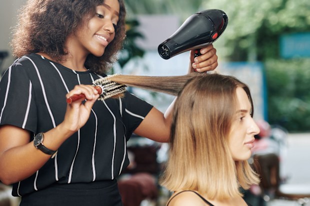 Woman at hairdressing salon