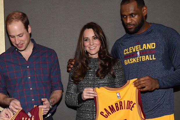 Prince William, Duke of Cambridge and Catherine, Duchess of Cambridge meet LeBron James (R) as they attend the Cleveland Cavaliers vs. Brooklyn Nets game