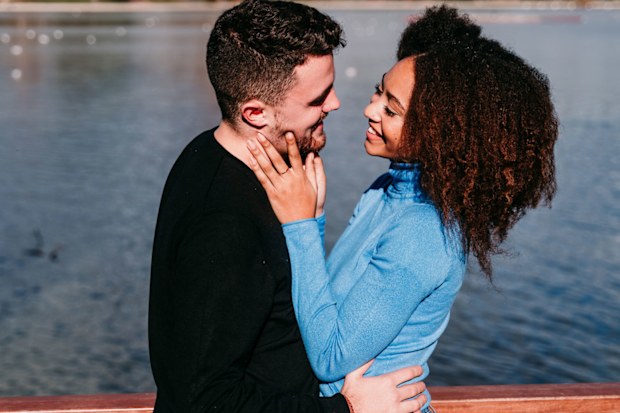 Young couple by the water