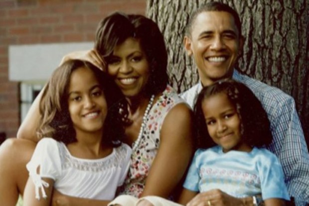 Michelle with husband Barack and daughters Sasha and Malia.  