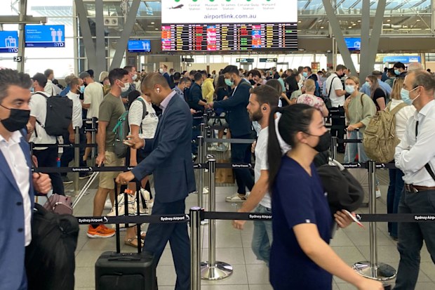 This photograph, taken last week, shows how busy the domestic terminal at Sydney airport is already getting.
