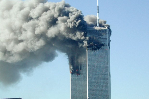 Smoke pours from the World Trade Center after being hit by two planes on the morning of September 11, 2001.