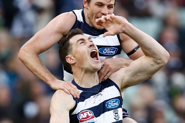 Jeremy Cameron mimicked cracking open a can of beer following his second goal in the final quarter of the grand final