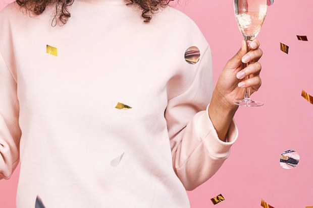 Woman holding birthday balloon