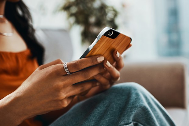 Woman texting on smartphone