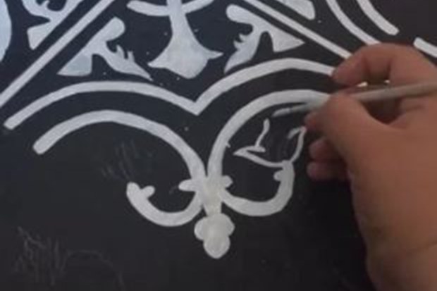 Woman completely transforms bathroom tiles with stunning paint job